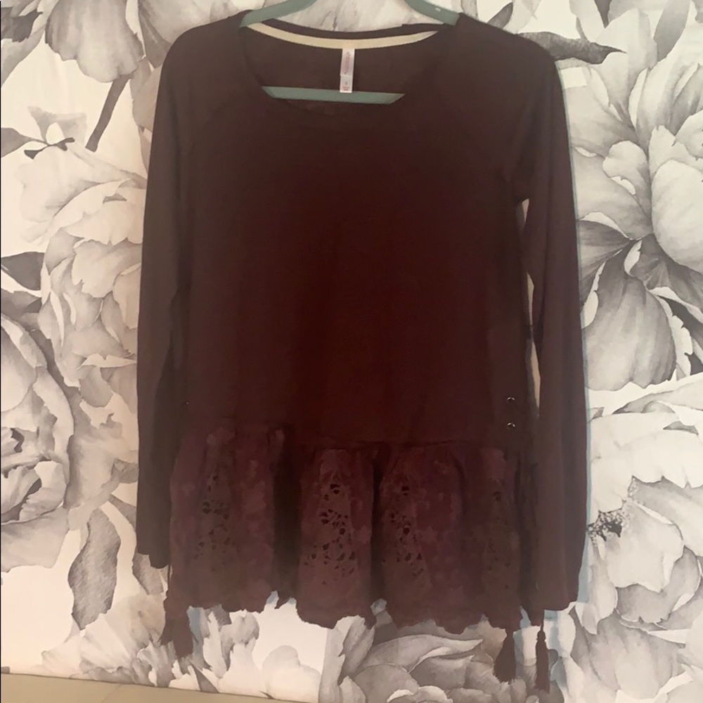 Peplum top with lace detail
